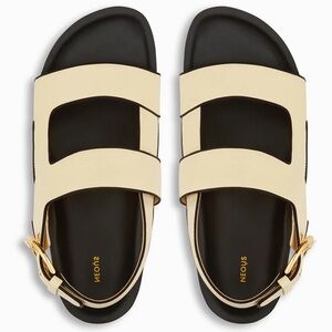 Size 11 (EU 41) Neous cream and black platform sandals in excellent condition!